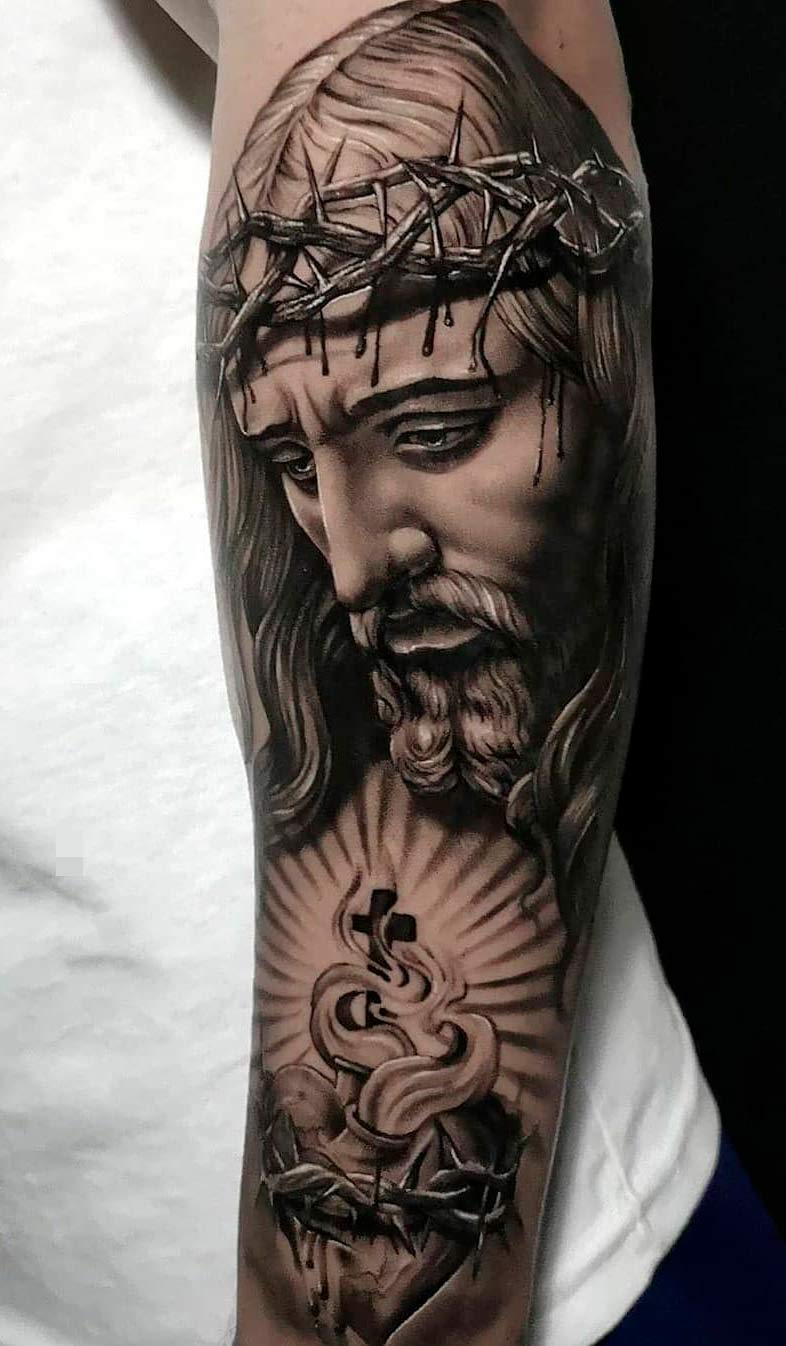tatuagem-de-jesus-no-antebraco 