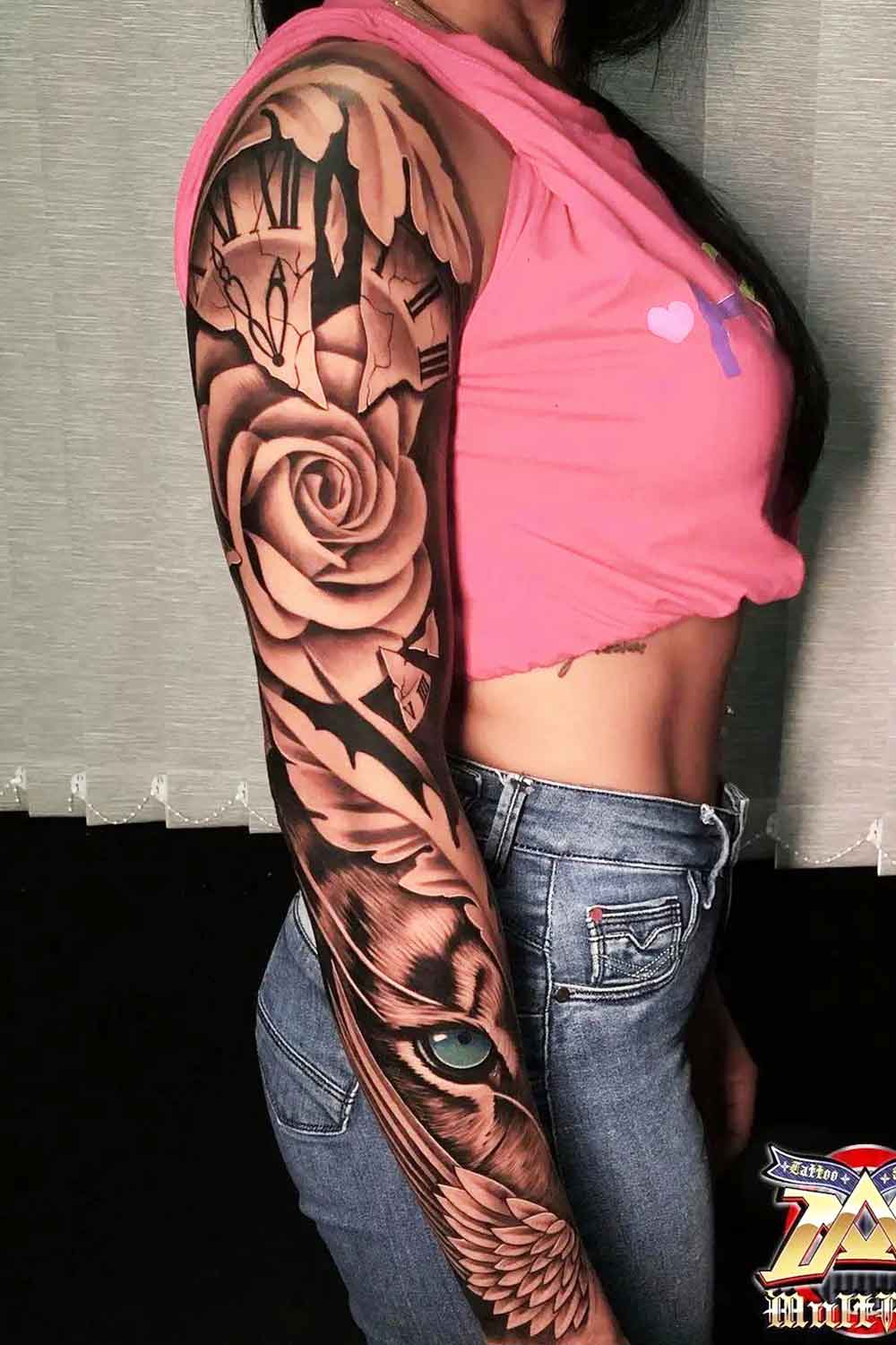 braco-feminino-fechado-de-tatuagens-1 