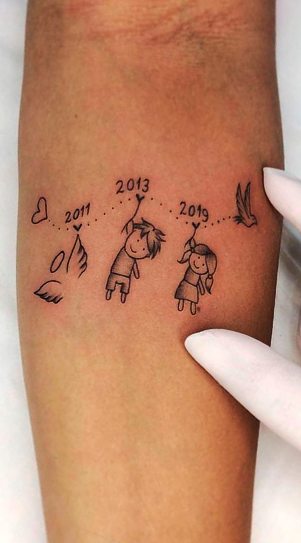 tatuagem-em-homenagem-aos-filhos-com-data 